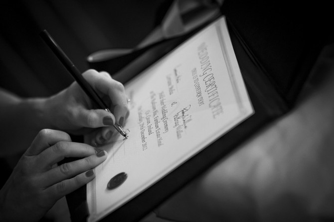 signing the wedding certificate